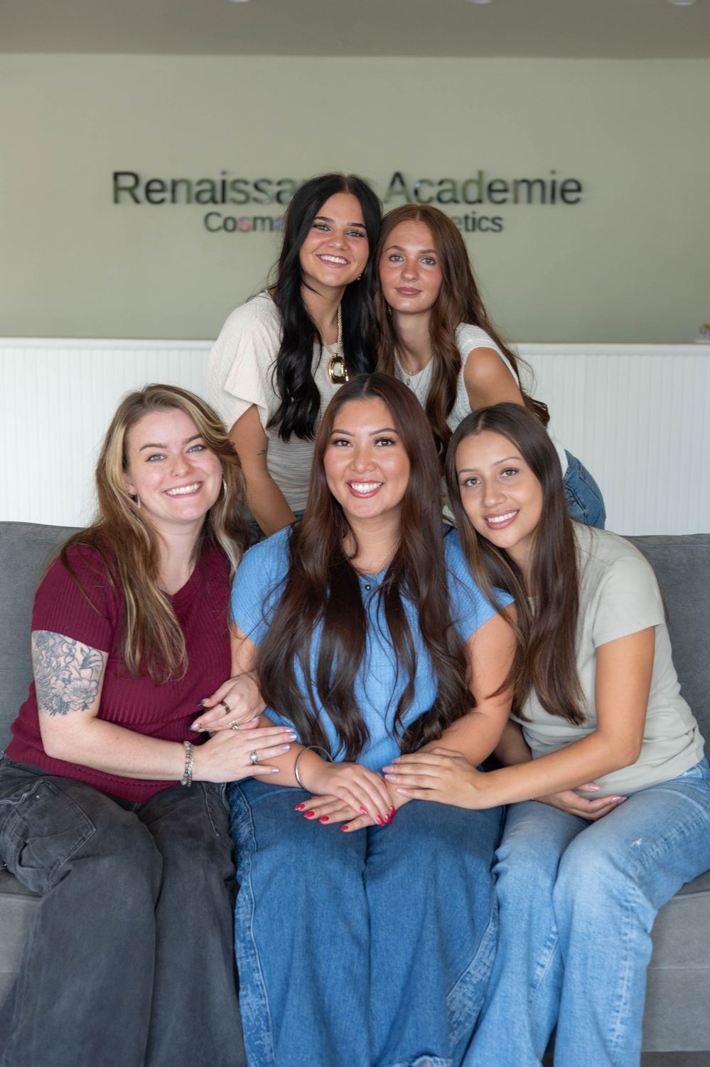 Five people in reception, portrait crop